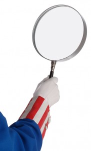 Uncle Sam Arm holding Magnifying Glass